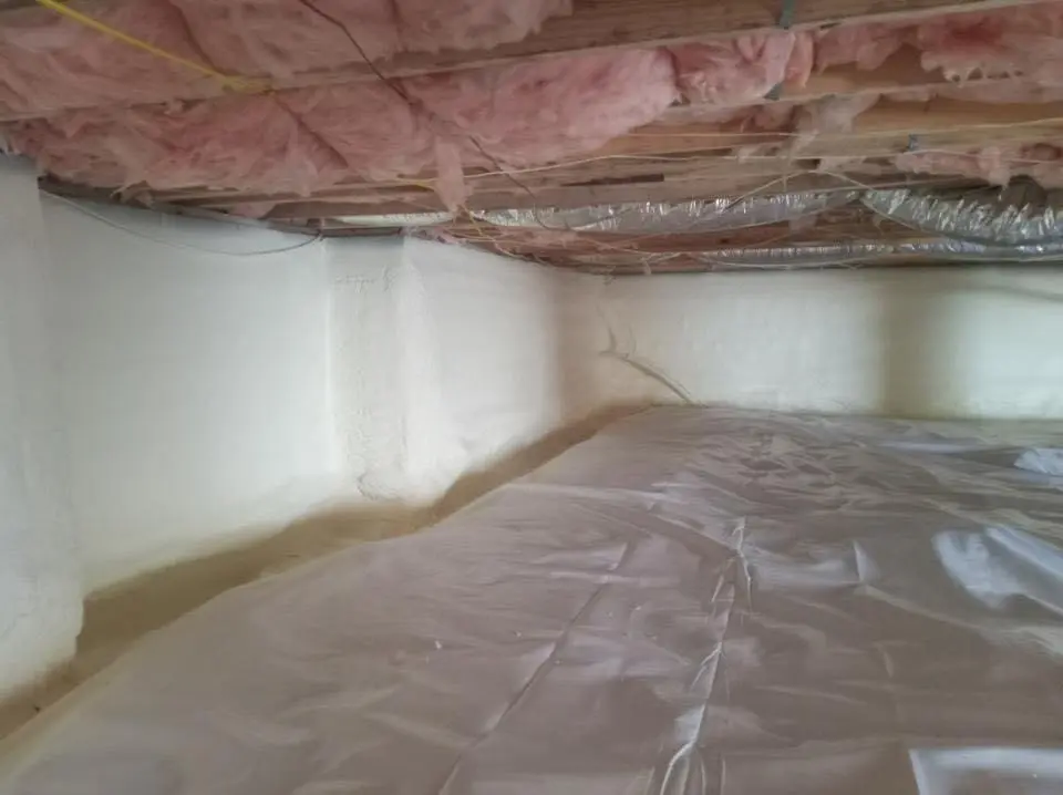 Crawl space encapsulation with closed-cell spray foam for Roof Waterproofing in Tecumseh
